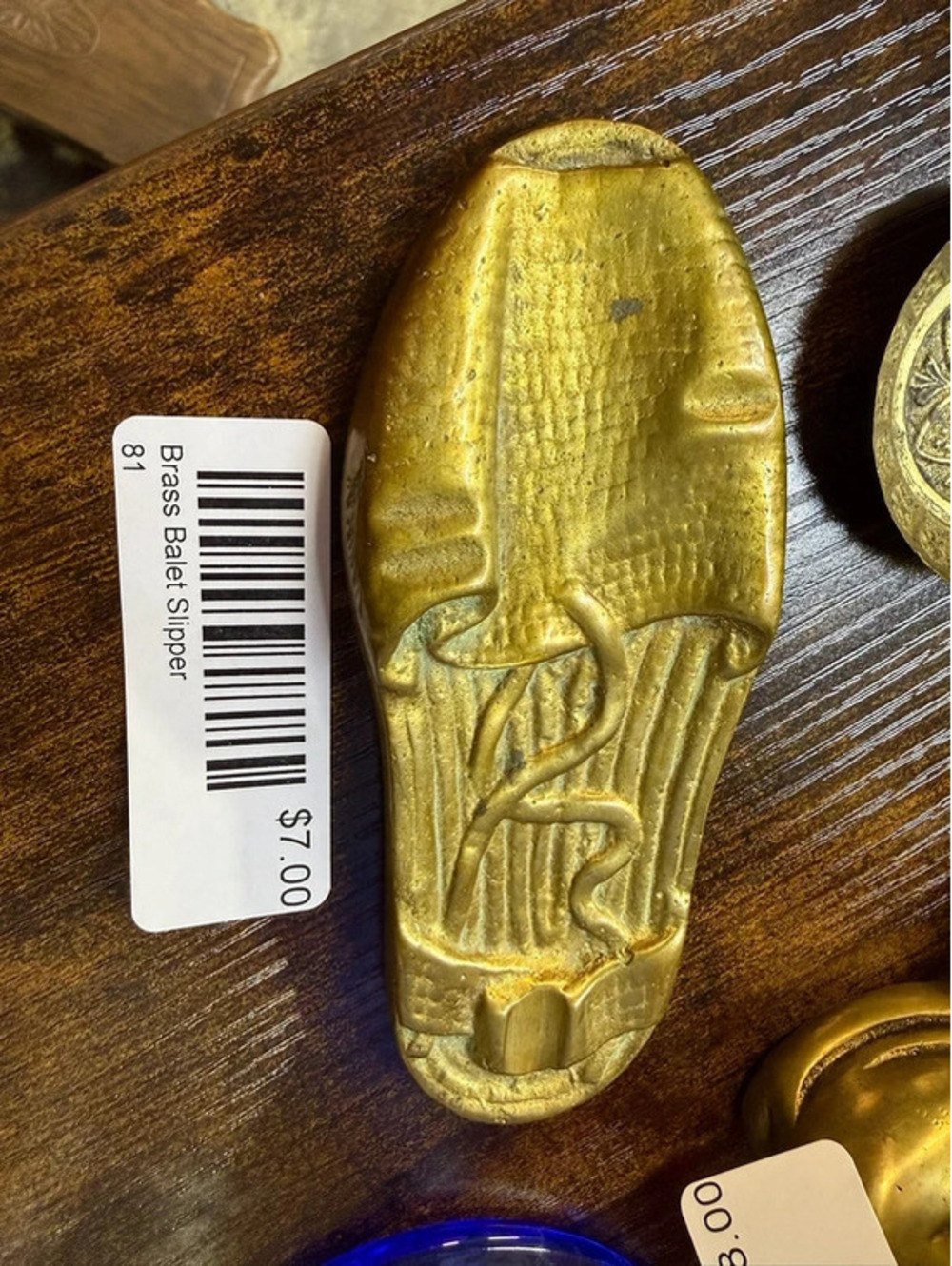 Brass ballet slipper